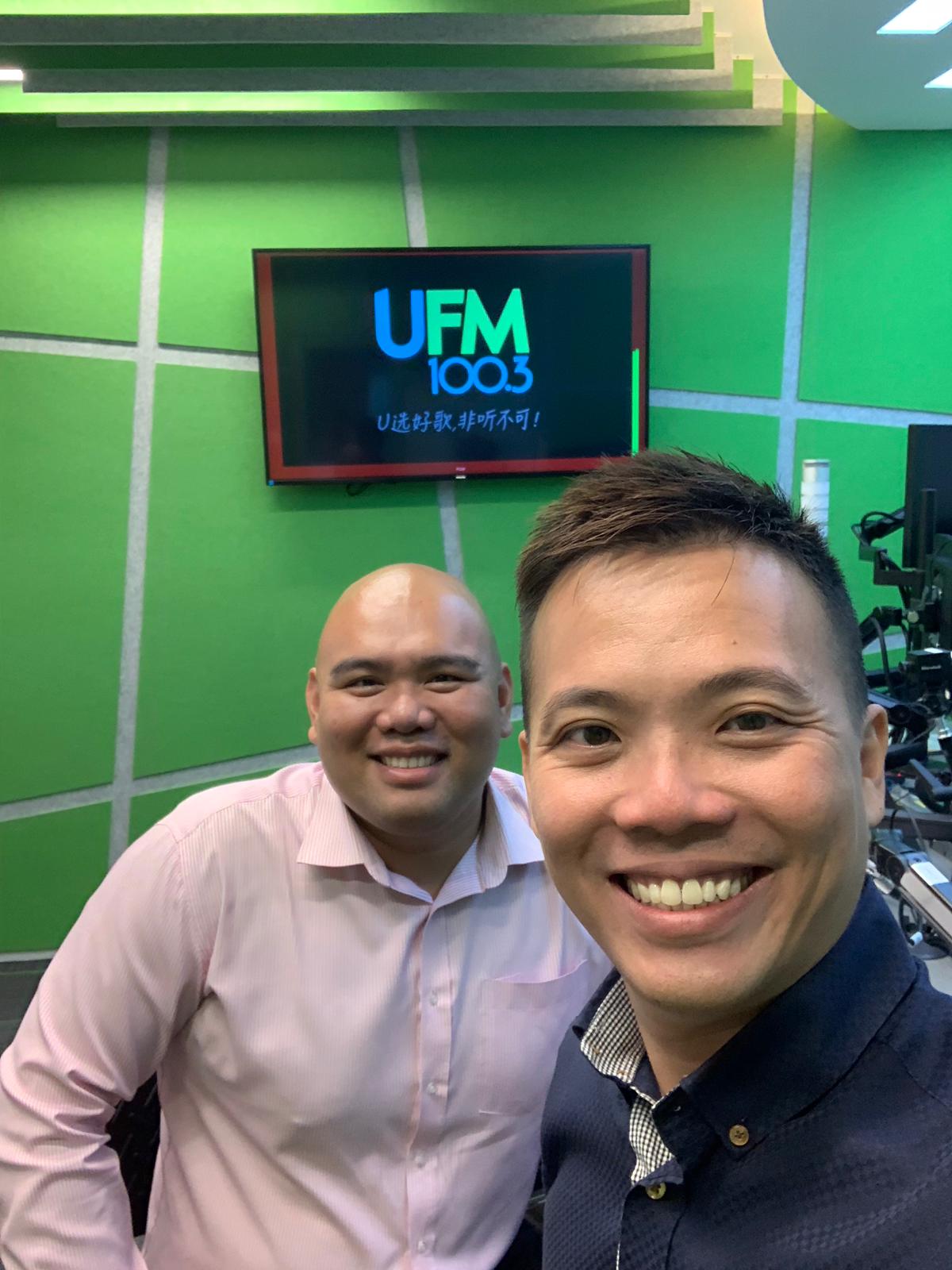 Two We Will speakers in the UFM 100.3 radio studio